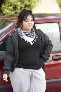 Overweight woman smoking 